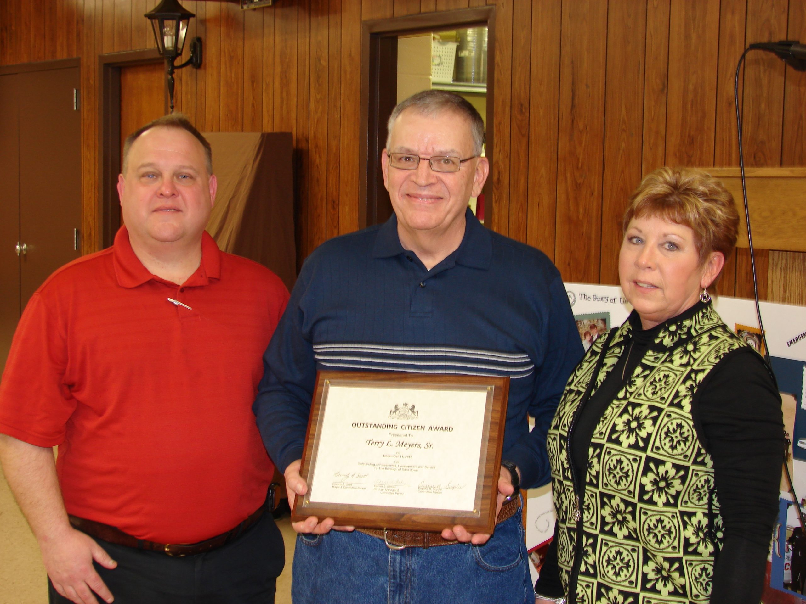 Mayor Terry Meyers (middle) receiving the 2010 Outstanding Citizen Award, Council President Ron Smith (left), Borough Manager Connie Stokes (right)